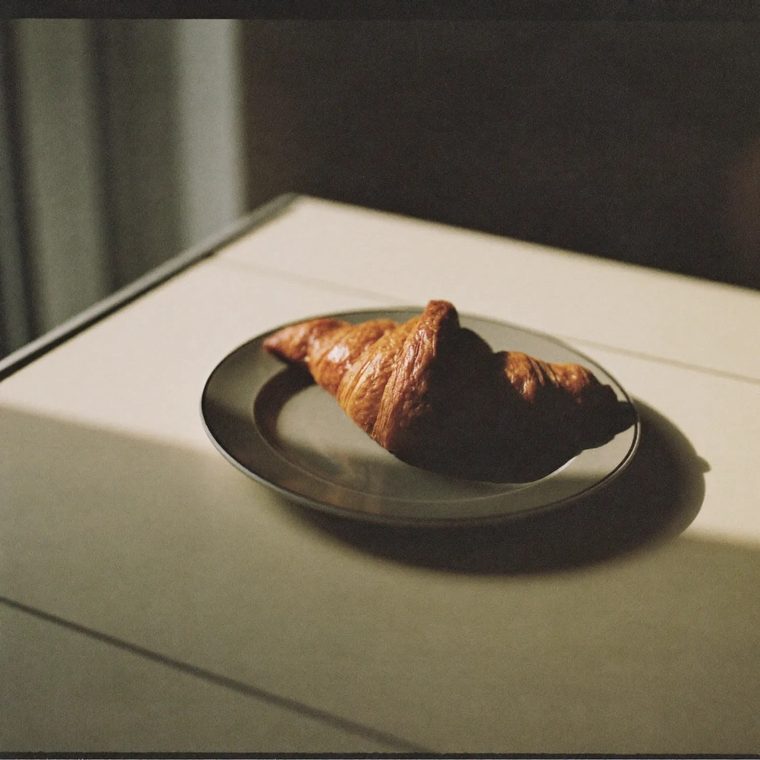 A croissant on a small plate
